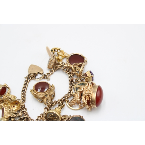 10 - A 9ct Tested Vintage Charm Bracelet, Comprising of 17 Charms mostly Stone Set. Gross Weight: 75g (To... 