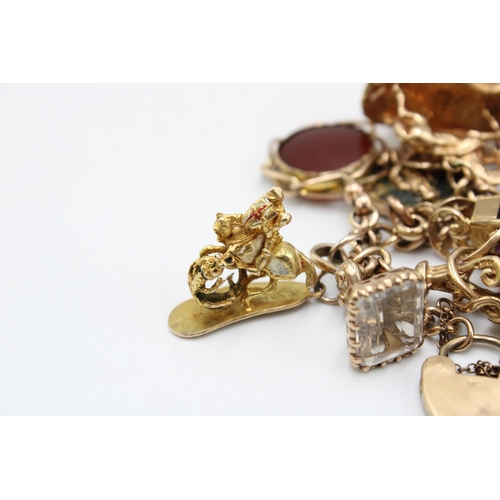 10 - A 9ct Tested Vintage Charm Bracelet, Comprising of 17 Charms mostly Stone Set. Gross Weight: 75g (To... 