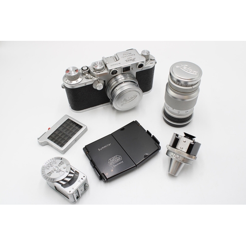  A 1951, Leica&nbsp;IIIf&nbsp;with Summitar f/2 5cm collapsible lens and accessories to include&nbsp;... 