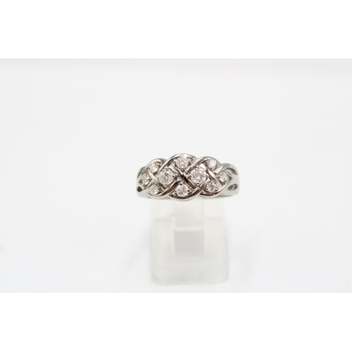  A 9ct gold brilliant cut diamond set band ring. Size P. Weight 4.63 grams