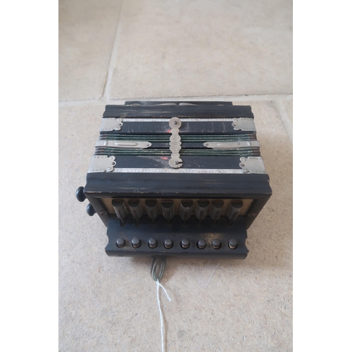 442 - A small eight button accordion, German, possibly Kalbe or Hohner, late 19th or early 20th century, e... 