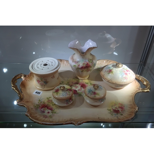 445 - A Royal Devon ceramic vanity service, early 20th century, including a tray, three jars and a vase, p... 