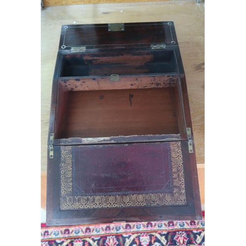 454 - A rosewood and mother of pearl writing slope, 19th century, the lid inlaid with foliate cartouches, ... 