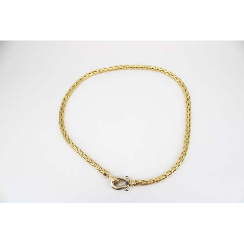 172 - An Italian believed to be Roberto Coin Spiga 18ct gold woven link necklet. With three sapphire caboc... 