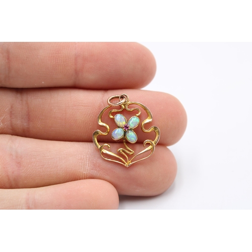 12 - A 9ct Edwardian Opal & Ruby Floral Pendant, 2cm x 2cm.Weight: 1.63g&nbsp;