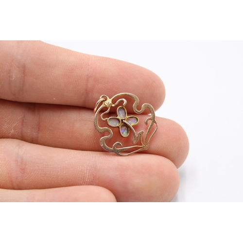 12 - A 9ct Edwardian Opal & Ruby Floral Pendant, 2cm x 2cm.Weight: 1.63g&nbsp;