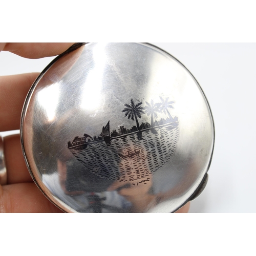 314 - An Iraqi Marsh Arab Silver Compact, Featuring a filagree Lid with Engraved Cartouche. To back, an en... 