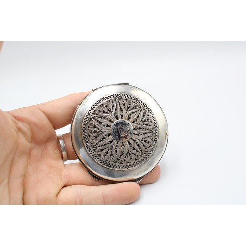 314 - An Iraqi Marsh Arab Silver Compact, Featuring a filagree Lid with Engraved Cartouche. To back, an en... 