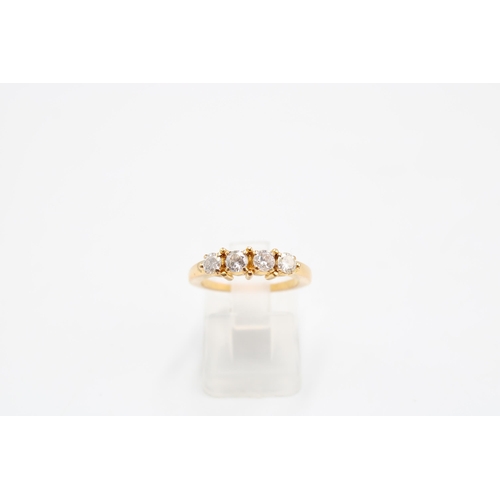 174 - An Unmarked 18ct Tested Diamond Five Stone Ring, Approximate Diamond Content 0.60ct.&nbsp;Weight: 4g... 