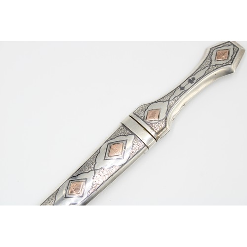 458 - A Late 19th, Early 20th Century Iraqi Marsh Arab Silver Dagger or Jambiya. Featuring a Curved Body w... 