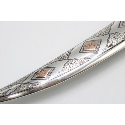 458 - A Late 19th, Early 20th Century Iraqi Marsh Arab Silver Dagger or Jambiya. Featuring a Curved Body w... 