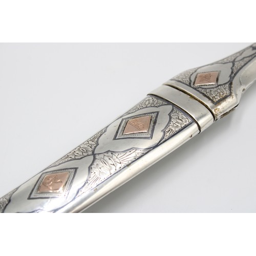 458 - A Late 19th, Early 20th Century Iraqi Marsh Arab Silver Dagger or Jambiya. Featuring a Curved Body w... 