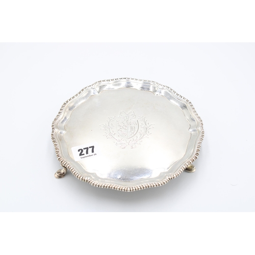  A silver salver, Richard Rugg, London, 1771, engraved with an armorial crest, diameter 18cm, weight ... 