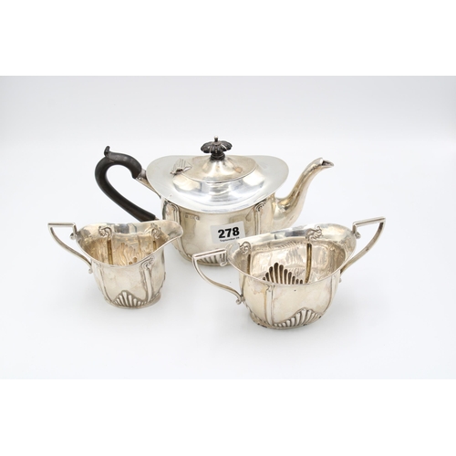  A silver tea service, W G Keight & Co, Birmingham, 1903, comprising a tea pot with wood handle a... 