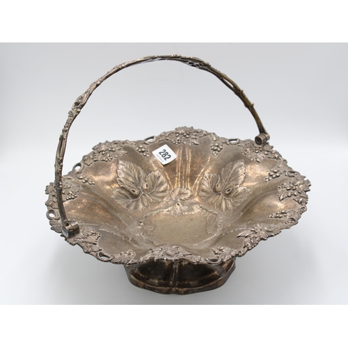  A large silver centerpiece basket, Henry Wilkinson & Co, London, 1857, cast and chased with grap... 