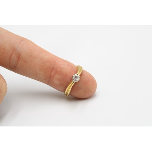  A diamond and gold solitaire ring, wavy shoulders, hallmarks partially rubbed, size L, gross weight ... 