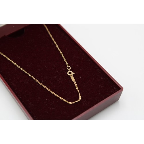  A 9ct gold chain, delicate faceted links, length 51cm, weight .94g