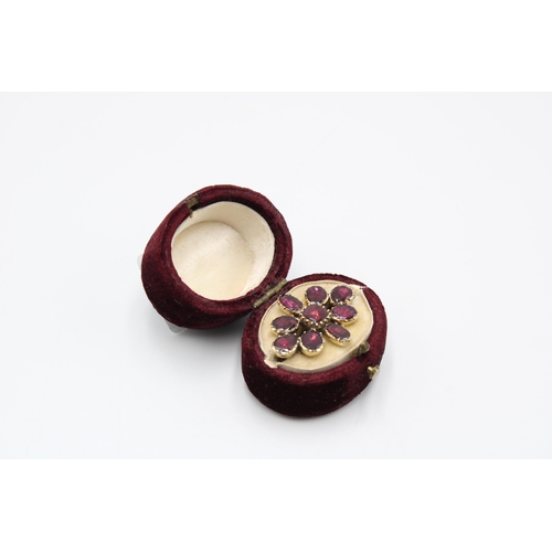 21 - A 15ct gold and almandine garnet brooch, probably early 19th century, unmarked but tested as 15 ct, ... 