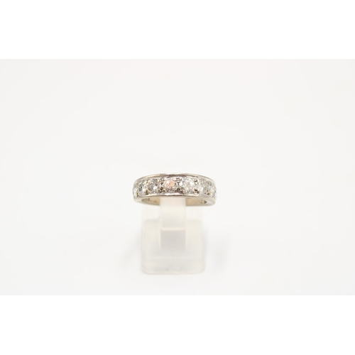  A brilliant cut diamond nine stone band ring. Estimated total weight 1.95cts, G/H colour, I1/I2 clar... 