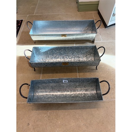 609 - A set of three Foras troughs - largest 60cm