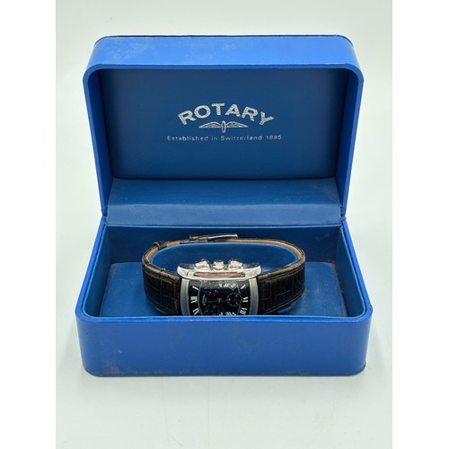266 - A Rotary chronograph watch, the black dial with whit Roman numerals, three subdials and date window,... 