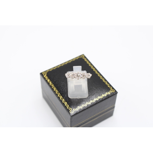 An 18ct Diamond Five Stone Ring, Approximately 1.4ct of Transitional Cut Diamonds. SI1/2 G/H. Head S... 
