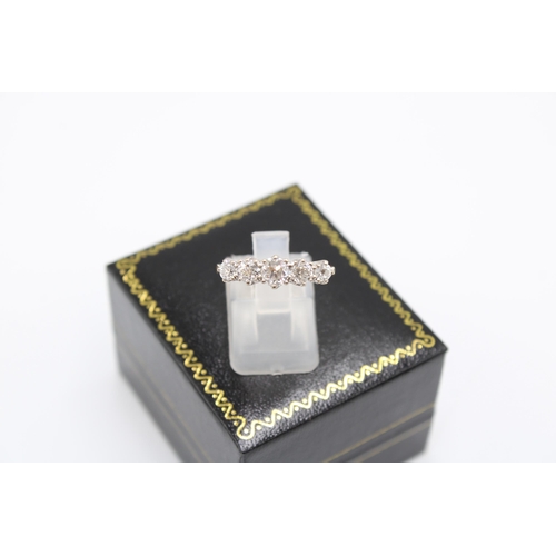  An 18ct Diamond Five Stone Ring, Approximately 1.4ct of Transitional Cut Diamonds. SI1/2 G/H. Head S... 