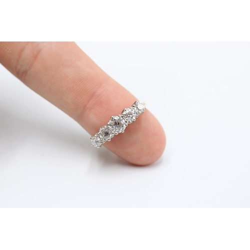  An 18ct Diamond Five Stone Ring, Approximately 1.4ct of Transitional Cut Diamonds. SI1/2 G/H. Head S... 