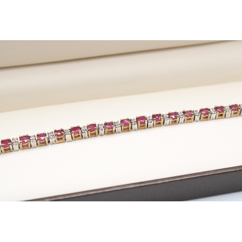  A ruby and diamond line bracelet. Length 190mm. Stamped 9K. Weight 10.19 grams.Condition: Good, brac... 