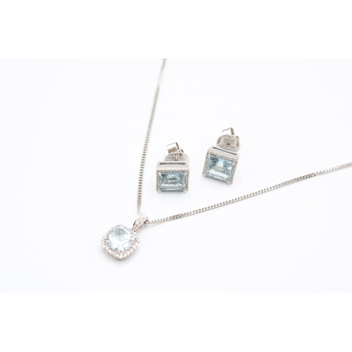  An 18ct gold aquamarine and diamond cluster pendant and earring set. Length of pendant 15mm, length ... 