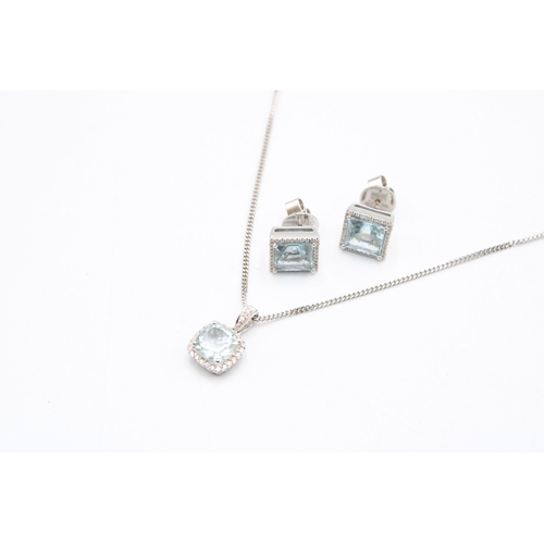  An 18ct gold aquamarine and diamond cluster pendant and earring set. Length of pendant 15mm, length ... 