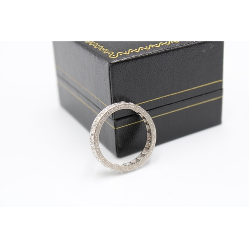 A 1920's/30's Platinum Diamond Full Eternity, Featuring approximately 1.4ct of transitional cut diam... 