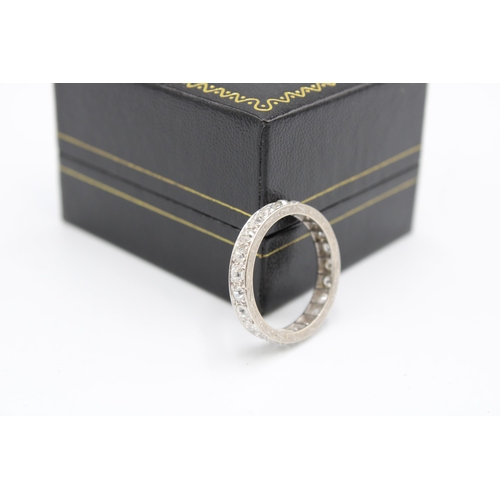  A 1920's/30's Platinum Diamond Full Eternity, Featuring approximately 1.4ct of transitional cut diam... 