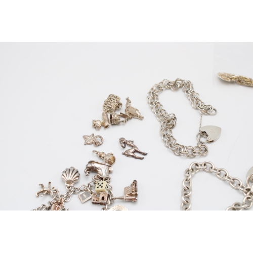  An Assortment of Silver Charm Bracelets to include One Damaged 9ct Figaro Chain&nbsp;Gross Silver We... 