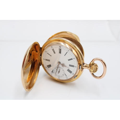  A fine European late 19th-century 18-carat gold full hunter chronometer pocket watch. The white enam... 