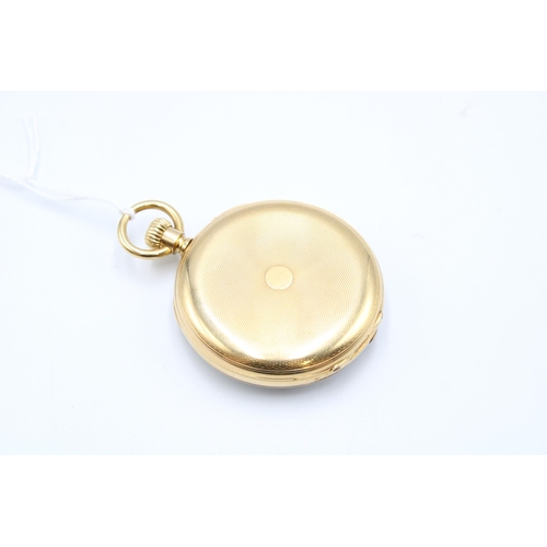  An 18ct French Open Faced Pocket watch featuring a white enamel dial with roman numerals, subsidiary... 