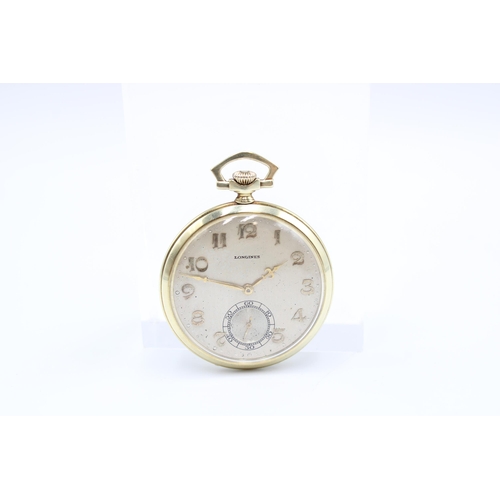  A 14ct Open Faced Longines Pocket Watch, Featuring Silvered dial with applied Yellow Hands & Num... 