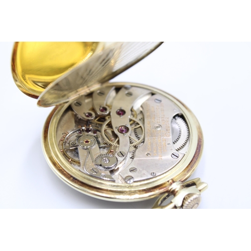  A 14ct Open Faced Longines Pocket Watch, Featuring Silvered dial with applied Yellow Hands & Num... 