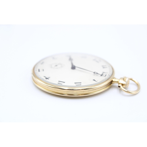  An 18ct Open Faced Pocket watch, Featuring a silvered dial with stylised arabic numerals, subsidiary... 