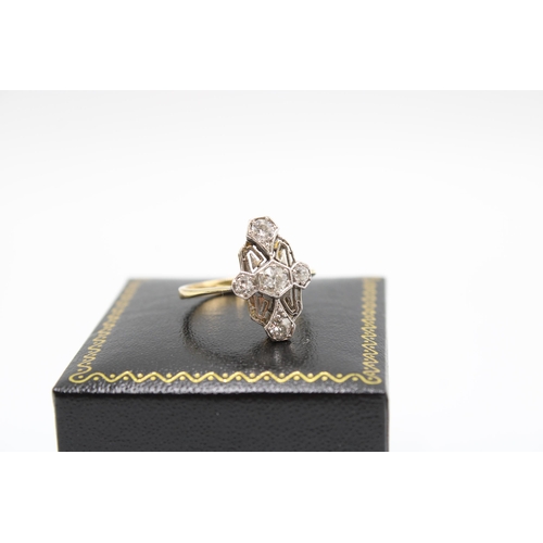  An Art Deco 18ct & Platinum Diamond Cocktail Ring, Featuring a geometric design with approximate... 