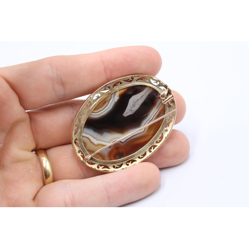  A 14ct Oval Striped Agate Brooch / Pendant 6cm x 4cm.&nbsp;Weight: 14.85g Condition: Stone appears f... 