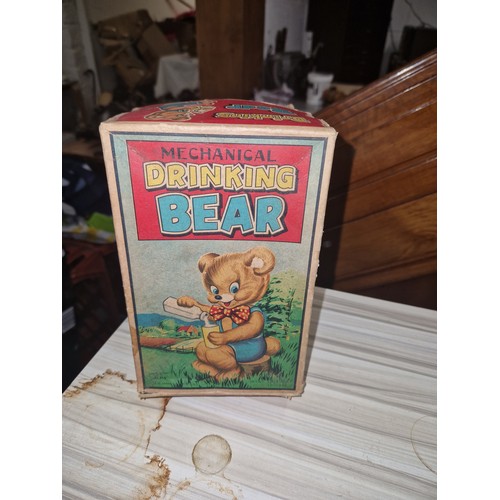 219 - Vintage mechanical drinking bear w/o