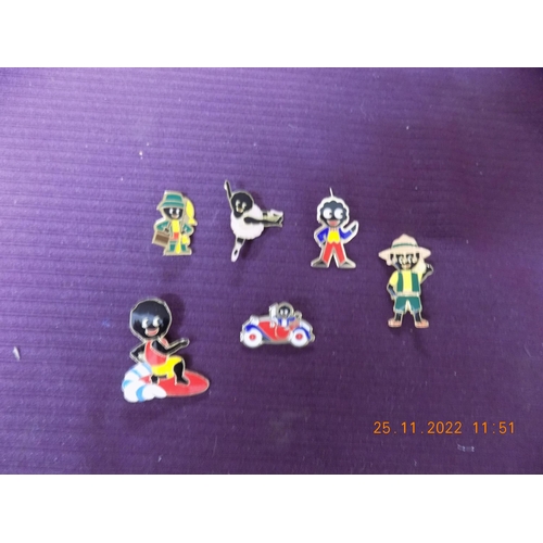 304 - Collection of Robinson Pin Badges