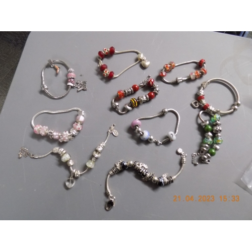 494 - Selection of Pandora Style Bracelets and Charms