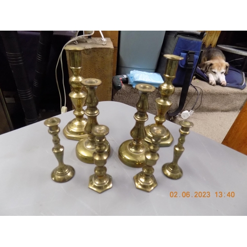 547 - 4 Sets of Brass Candle Sticks