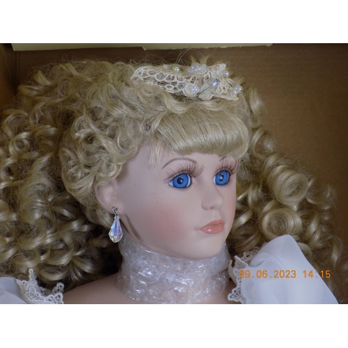 103 - 2 Palmory Collection Porcelain Dolls