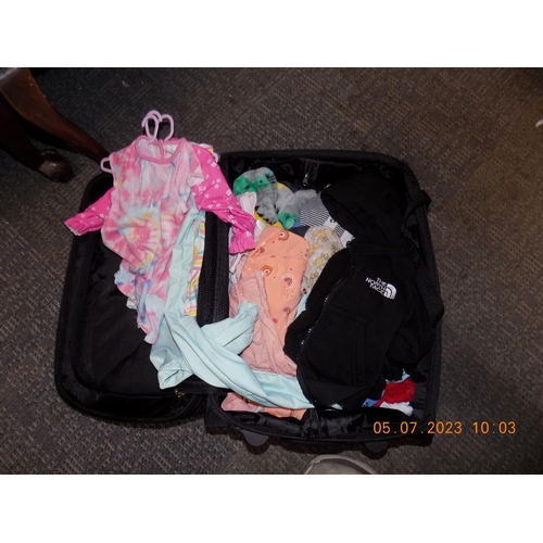 132 - Suitcase of Children's Clothes