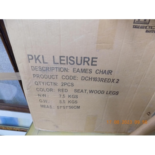 634 - 4 Boxed New Eames Chairs in Red