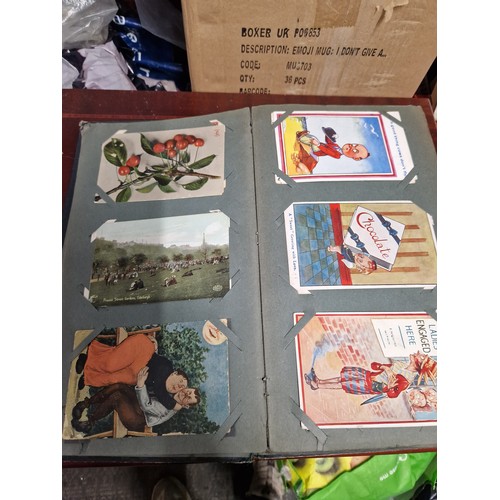 743 - A Vintage Postcard Album with 200+ Postcards. The Majority are early Edwardian Postcards.  Mostly To... 