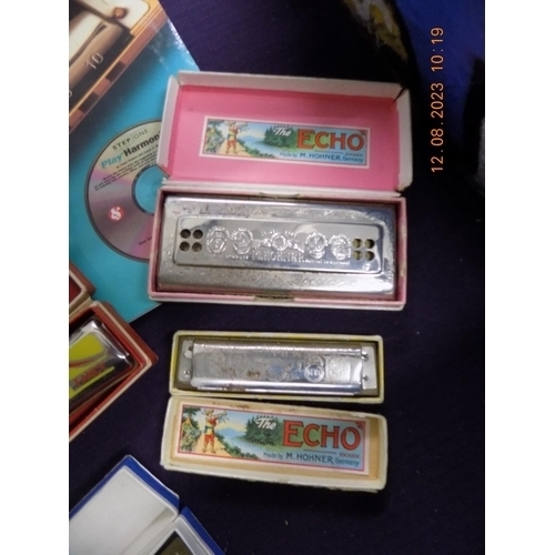 76 - Selection of Harmonicas inc Echo and a Play Harmonica Book